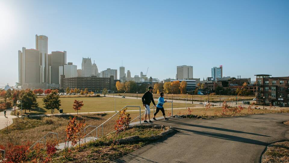 Southeast Michigan which includes a park and a sunset as well as a couple