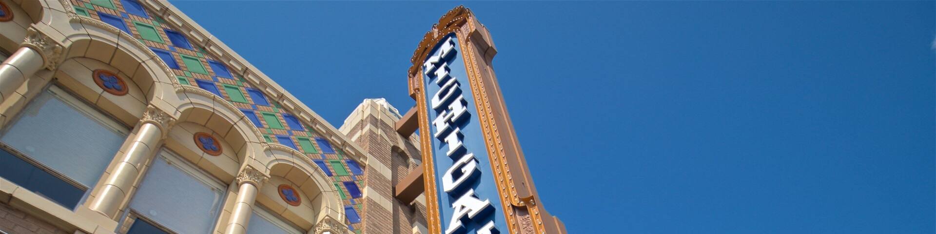 A theater marquee with "Taylor & Co" and "Making Sense" displayed.