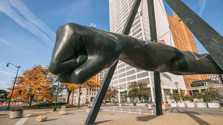 Downtown Detroit featuring outdoor art and a statue or sculpture