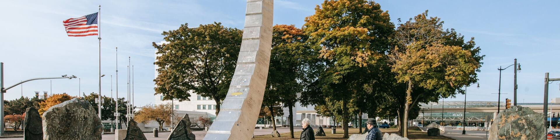 Downtown Detroit featuring a park as well as a couple