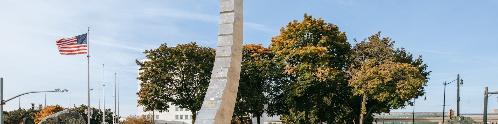 Downtown Detroit featuring a park as well as a couple