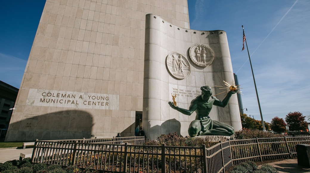 Downtown Detroit featuring a statue or sculpture