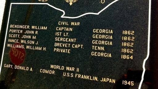 Congressional Medal of Honor plaque just outside the courthouse. Three of these men were members of a small Union Army party to penetrate 200 miles into the South and capture an enemy train in an attempt to destroy bridges and track between Chattanooga and Atlanta.