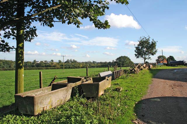 Warren Farm, Enderby The shadows are cast by two large metal barns.