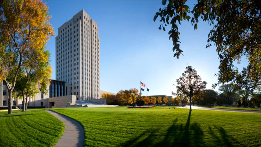 Bismarck which includes modern architecture, a high-rise building and a park