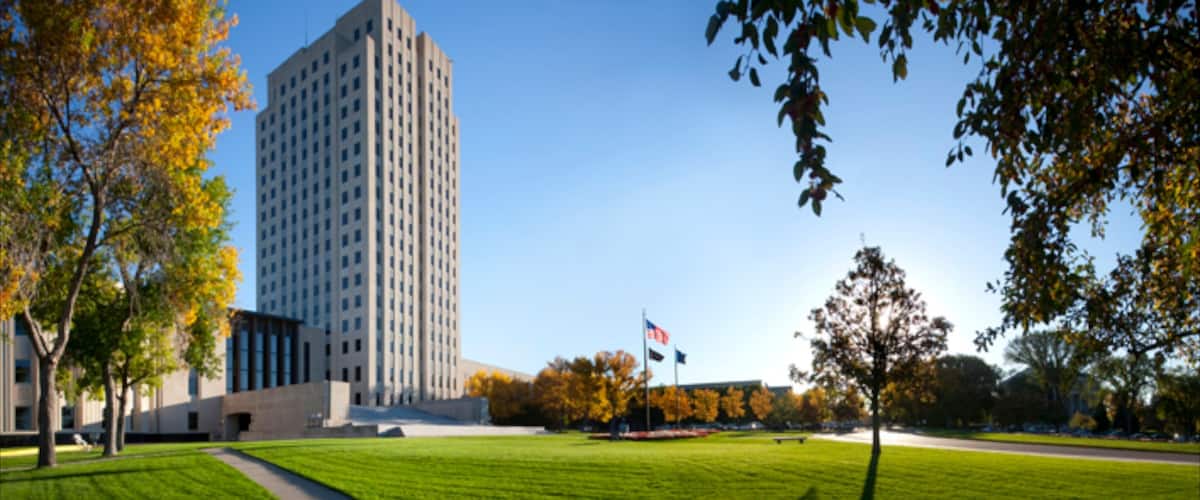 Bismarck showing modern architecture, a high rise building and a park