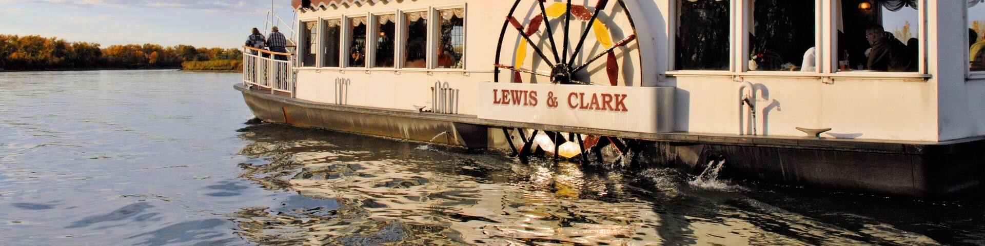 Bismarck which includes a river or creek and boating