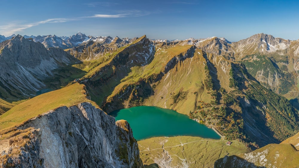 A mountain range with a lake nestled in a valley.