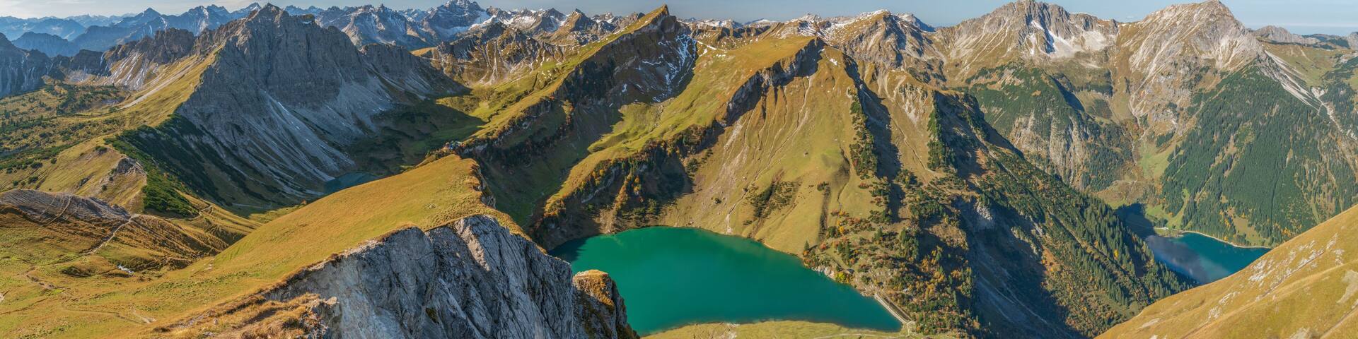 A mountain range with a lake nestled in a valley.