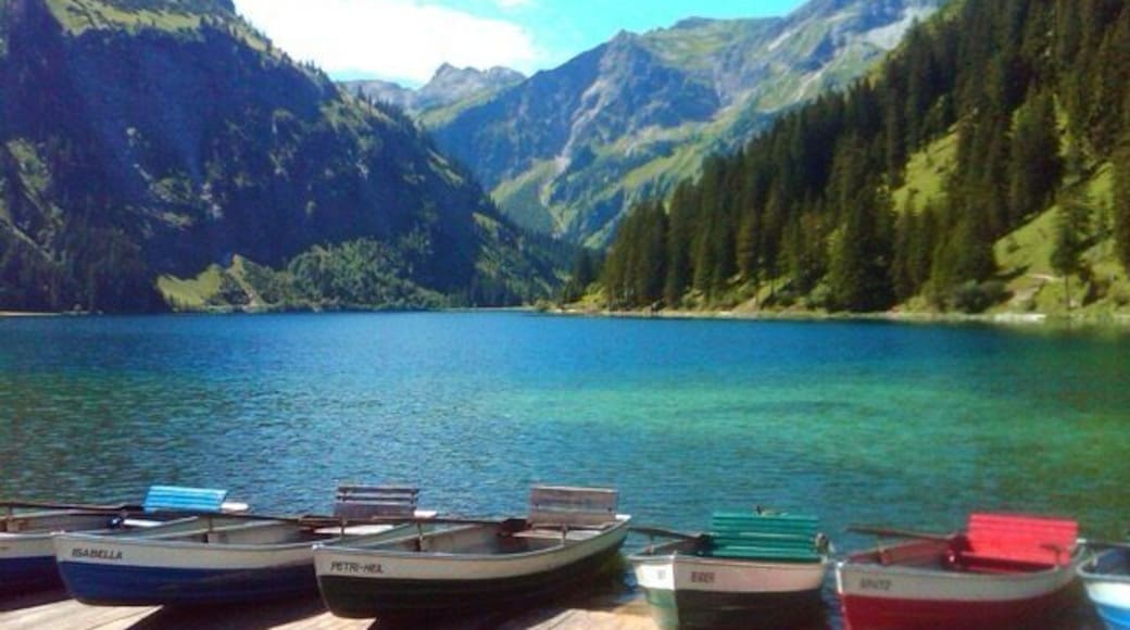 This picture was taken on a day trip in Austria! Beautiful and peaceful location with the best of nature all around! Mountains, trees, a beautiful walking path and of course boats to take out on the water for fishing or relaxing. This is the place I go to in my mind when I get stressed. #aquatrove