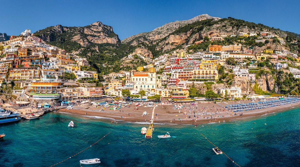 Aerial view of Positano with comfortable beach and blue sea on Amalfi Coast in Campania, Italy. Positano village on the Amalfi Coast, Salerno, Campania. Beautiful Positano, Amalfi Coast in Campania.