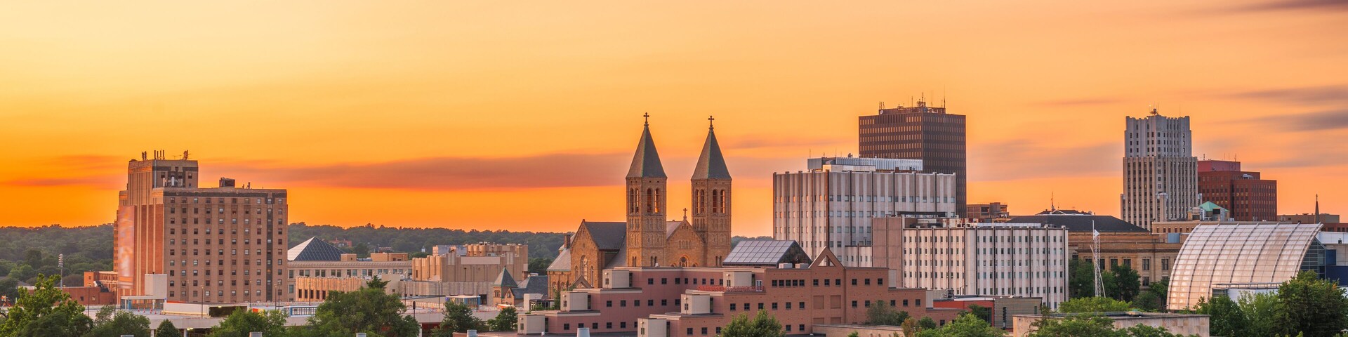 Akron, Ohio, USA downtown skyline at dusk.