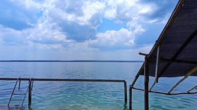 Beach Shoreline at Lake Peten Itza, San Jose, Peten, Guatemala