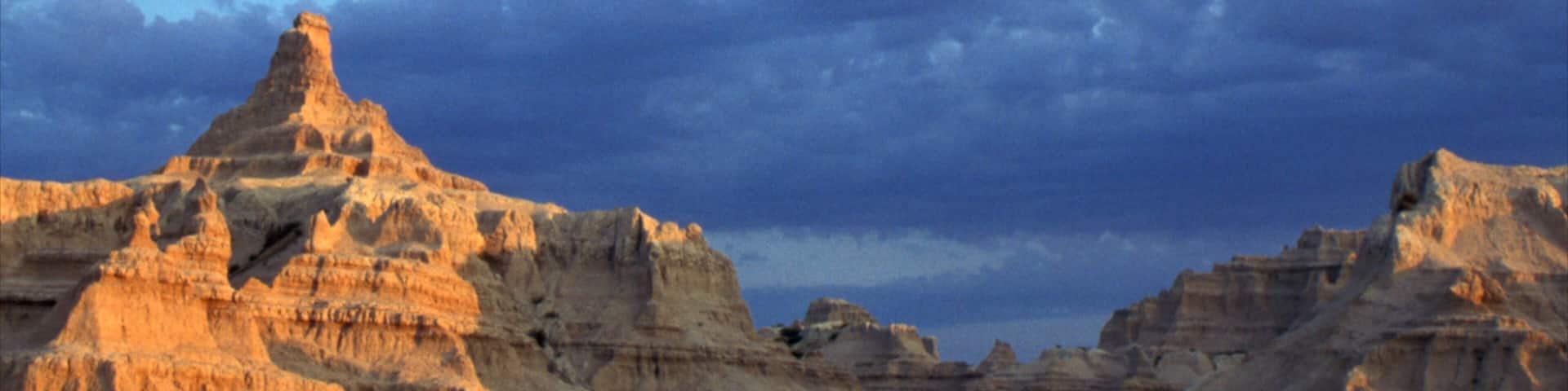 Rapid City which includes a gorge or canyon, mountains and tranquil scenes