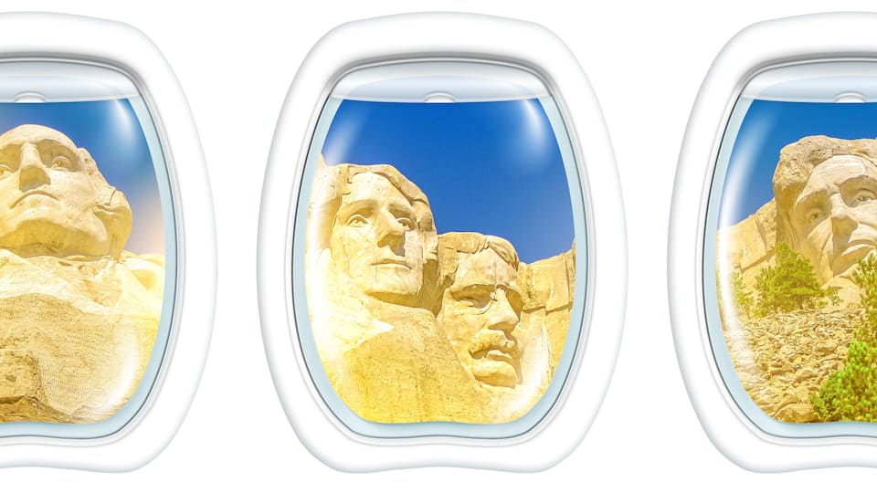 Three porthole frame windows on Aerial view of Mount Rushmore National Memorial of United States of America at sunset. US historical presidents: Washington, Jefferson, Roosevelt, Lincoln.