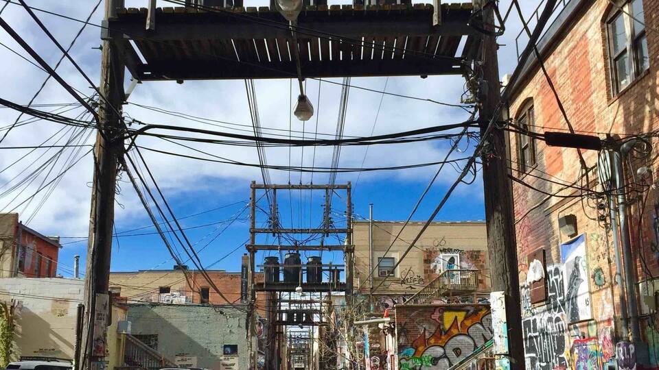 #Perspective
Stopped off in Rapid City on our way to Yellowstone NP, was blown away by the graffiti art down some of its back lanes. Thought the overhead power lines created great leading lines through the image.