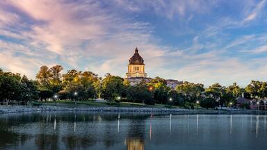 Illuminated South Dakota State Capitol at sunset