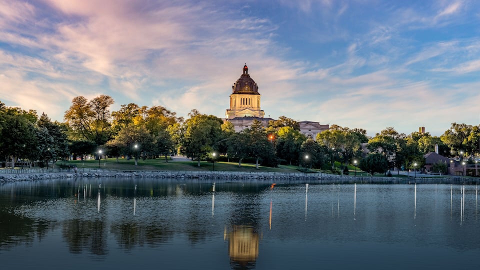 Illuminated South Dakota State Capitol at sunset
