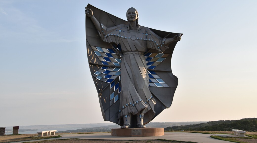 Dignity" statue depicting a Native American woman holding a star quilt, located near Chamberlain, SD