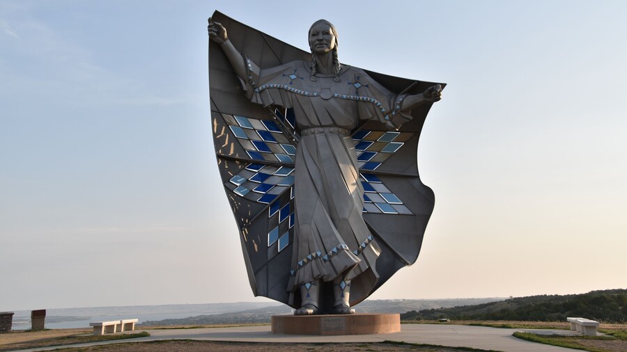 Dignity" statue depicting a Native American woman holding a star quilt, located near Chamberlain, SD