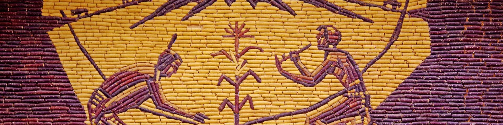 Out in the middle of South Dakota is this unique building called Mitchell's Corn Palace. The building is covered in many murals, inside and out, all made of corn cobs.