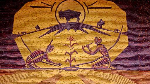 Out in the middle of South Dakota is this unique building called Mitchell's Corn Palace. The building is covered in many murals, inside and out, all made of corn cobs.