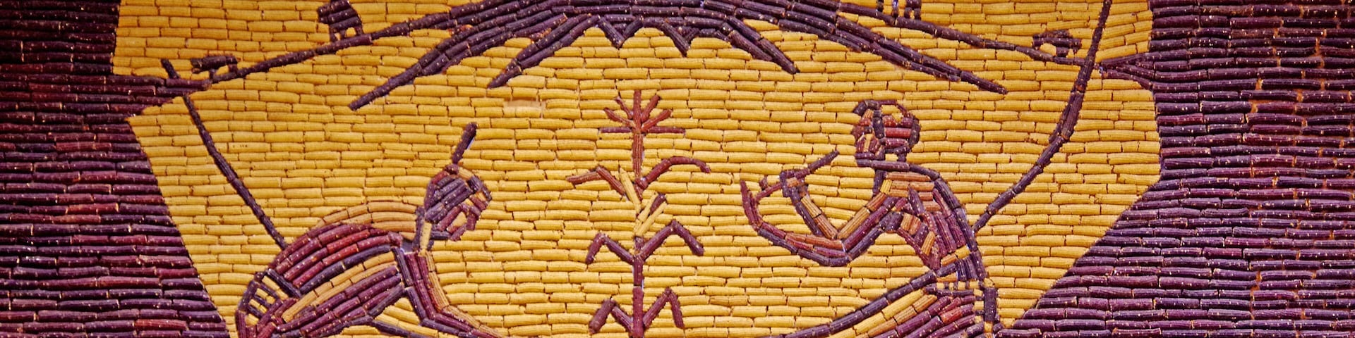 Out in the middle of South Dakota is this unique building called Mitchell's Corn Palace. The building is covered in many murals, inside and out, all made of corn cobs.