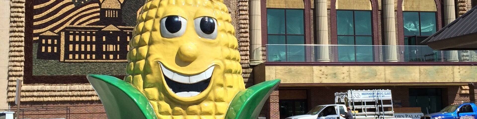A large corn sculpture in front of the Mitchell Corn Palace.