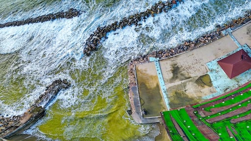 Storm in Marina di Pisa, Tuscany. Fury of the waves on the coast, aerial view on a sunny morning