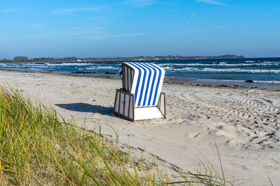 Beach chair with dunes on the island of Rügen on the Baltic Sea