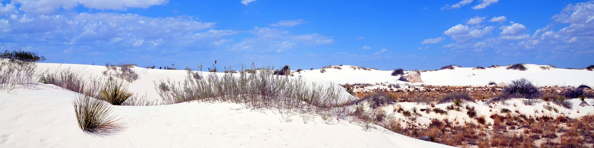 White Sands National Monument U.S located in the state of New Mexico the field of white sand dunes composed of gypsum crystals. The gypsum dune field is the largest of its kind on Earth.