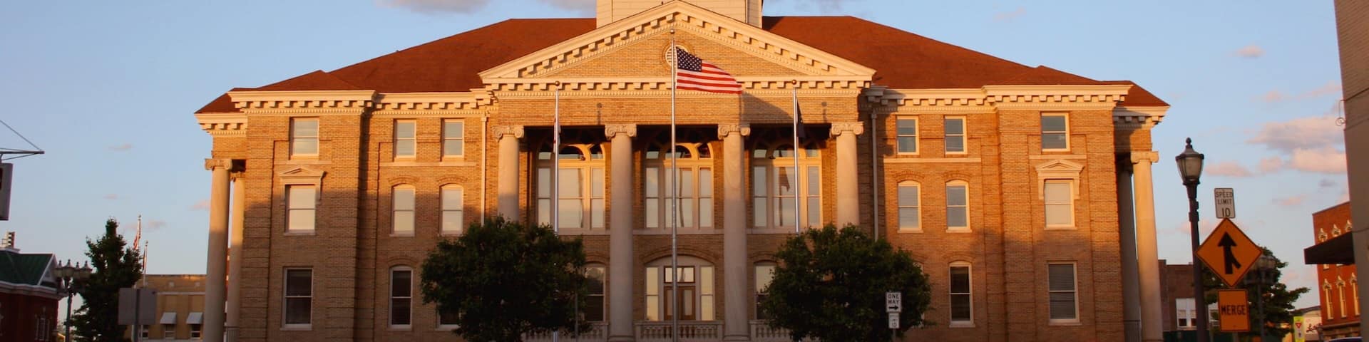 Jasper featuring an administrative buidling, a sunset and heritage architecture