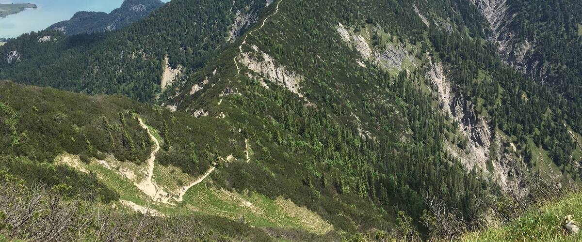 A mountain range with a lake in the valley.