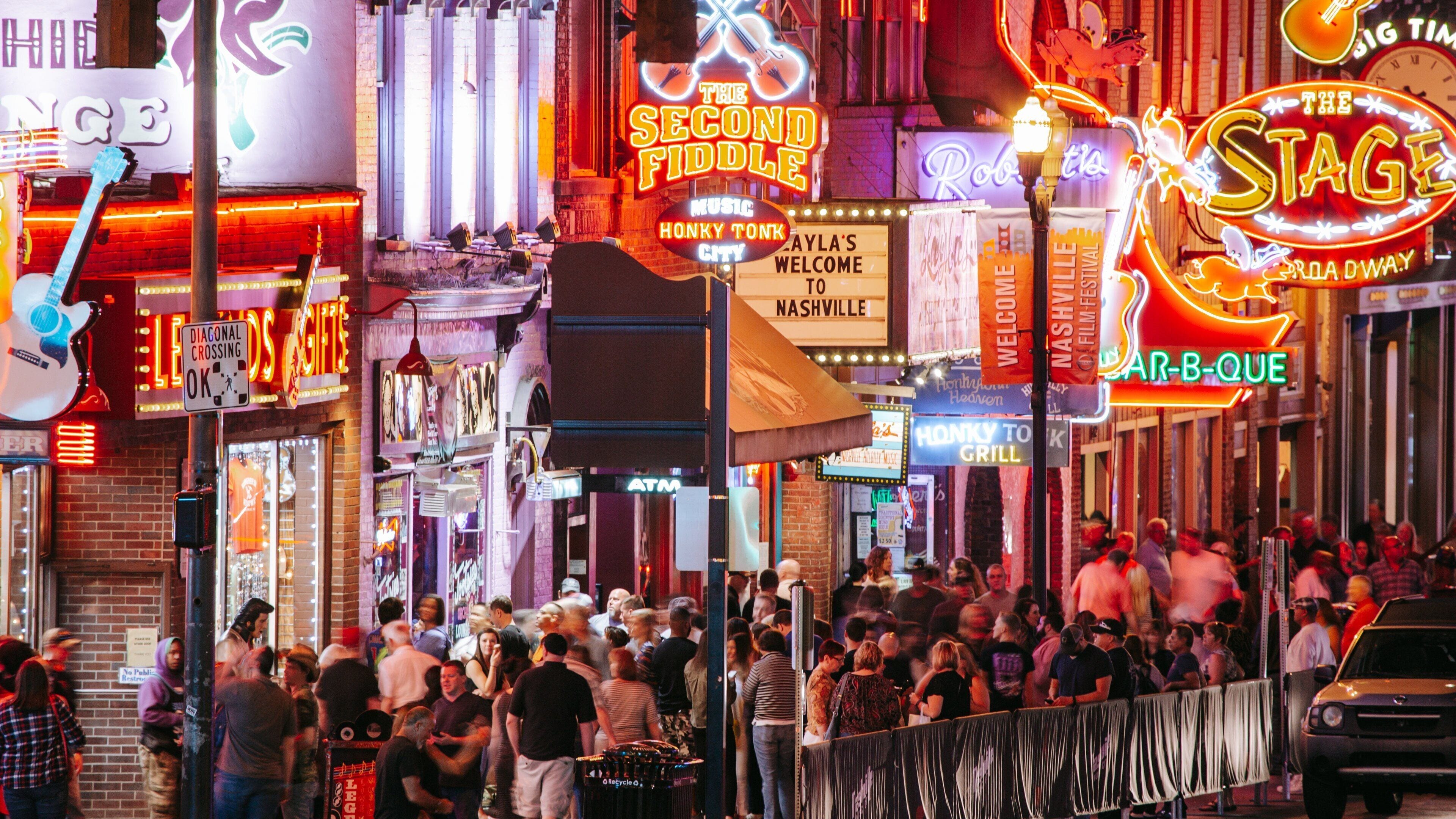 Music Row showing nightlife, night scenes and signage