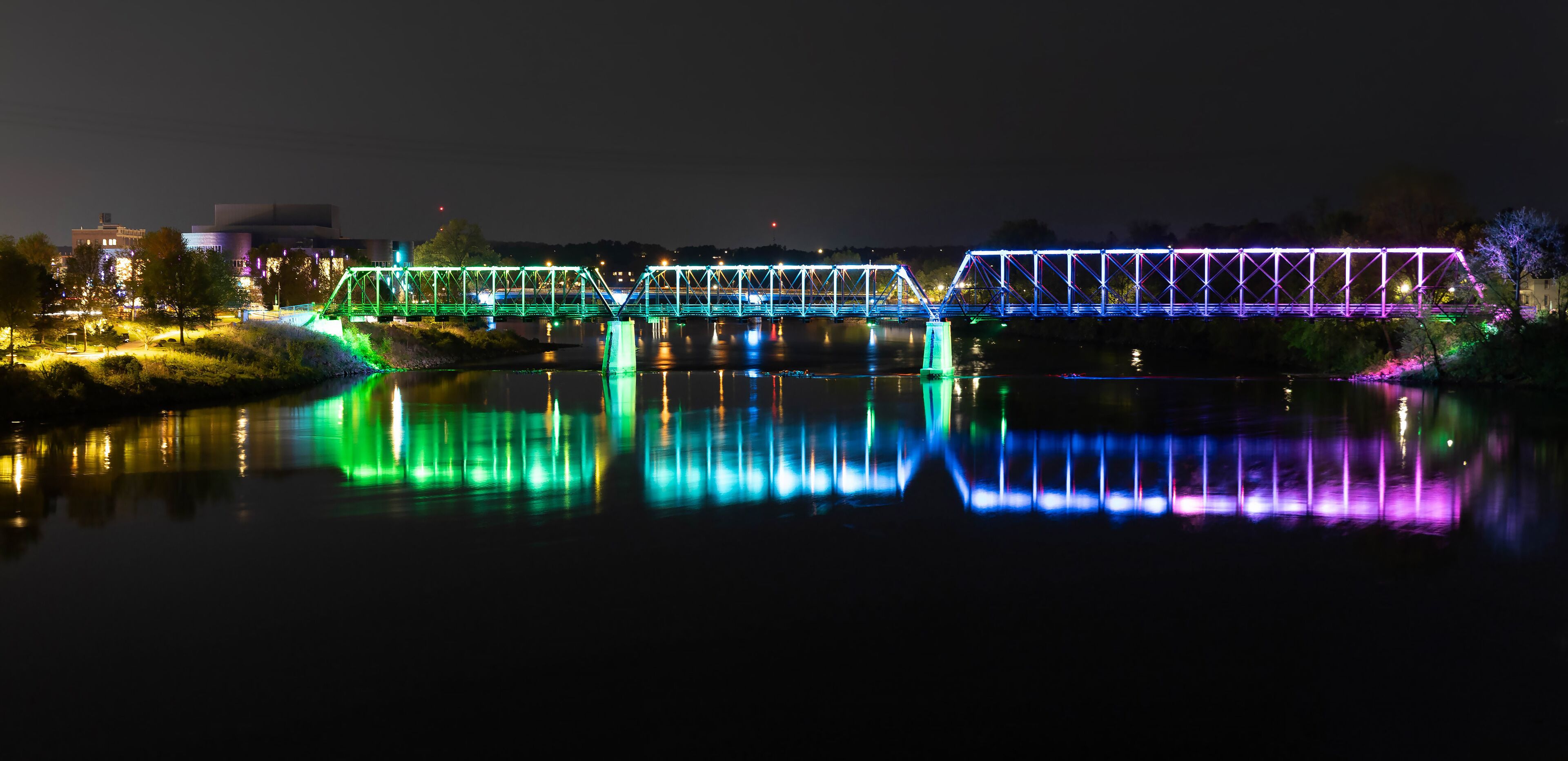 River Lights Bridge Illuminated at Night in Eau Claire