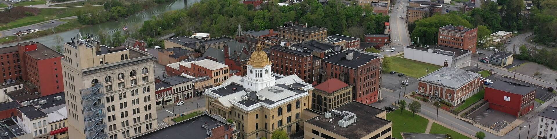 The Marion County courthouse in Fairmont, WV, and the surrounding small town and countryside in the appalachian mountains.
