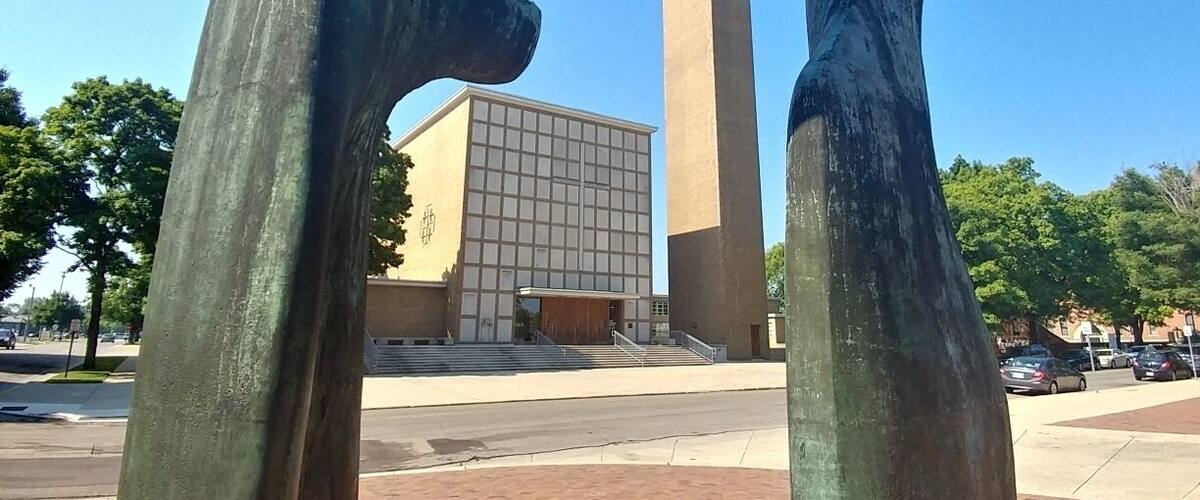 The First Christian Church designed by Eliel Saarinen framed by the Henry Moore sculpture "Large Arch".