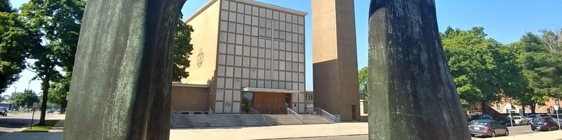 The First Christian Church designed by Eliel Saarinen framed by the Henry Moore sculpture "Large Arch".