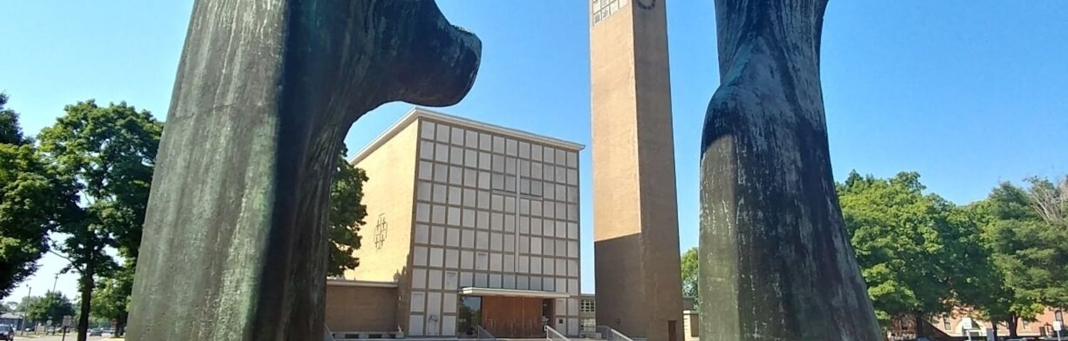 The First Christian Church designed by Eliel Saarinen framed by the Henry Moore sculpture "Large Arch".