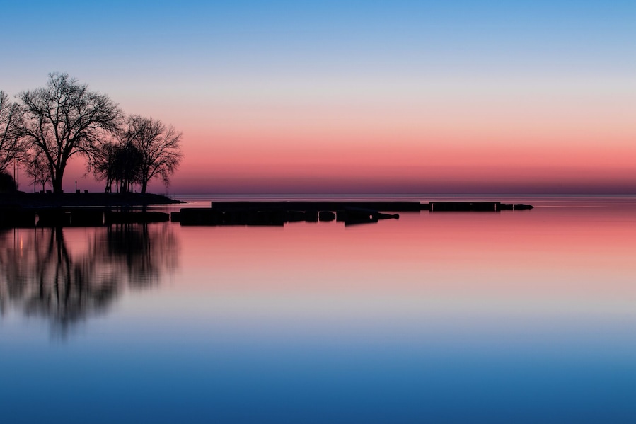 Getting out on the jetty to get this photo is just ONE of the perspectives you are presented with when you get down to the lake shore in Sheboygan County.
Facing north, the sunrise just appeared to have so many natural colors for this long exposure. Plus, the calm waters looked even more so at 4 seconds.
If you get to the eastern side of Wisconsin, in Sheboygan County, heading to the lake is a MUST.