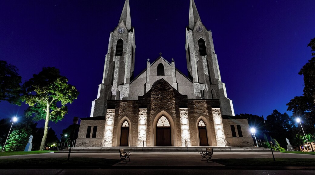 This church is lit up like day time all night long. Driving to Lake Michigan for photos over the last 5 years, this church stands out like a sore thumb.
A quick right and left from the main route to the lake and you are sitting right in front of it.
Taken early in the morning during a blue light sunrise. A wide angle lens makes the building look totally ominous, don't you think?