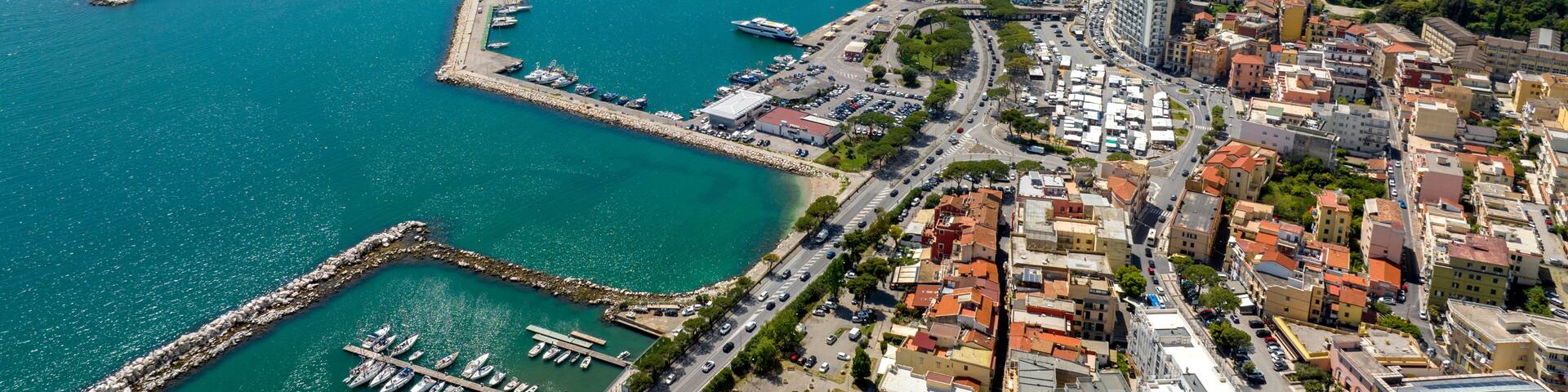 Aerial view of the port of the city of Formia, in the province of Latina, Lazio, Italy. This harbour overlooks the Mediterranean Sea. In the background is the panorama of the Lazio coast.