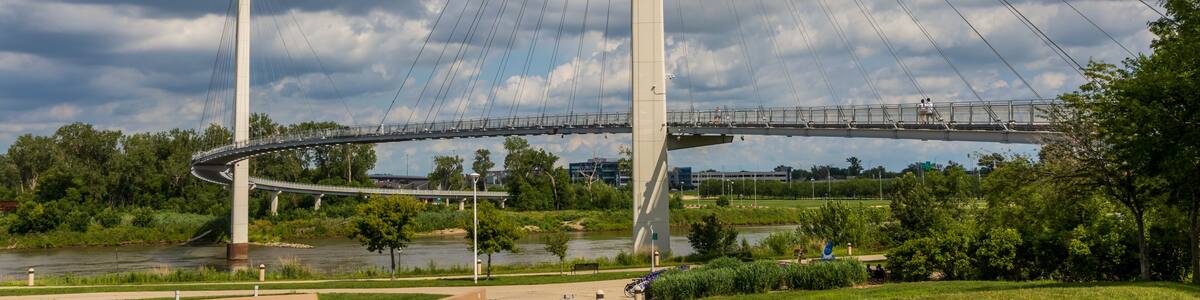 The Bob Kerrey Pedestrian Bridge crosses over the Missouri river, connecting Omaha, Nebraska with Council Bluffs, Iowa