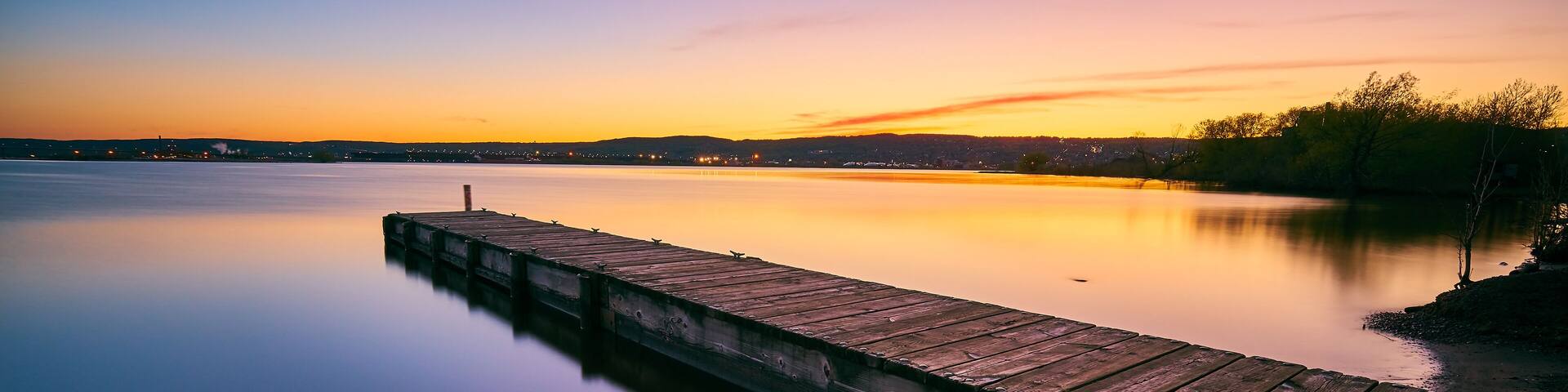 Pink and purple Sunset at Port Terminal Beach Duluth Minnesota