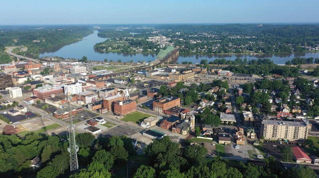 Expansive aerial view showcases Parkersburg, West Virginia, featuring the downtown area, the Ohio River, and the Little Kanawha River on a clear day.