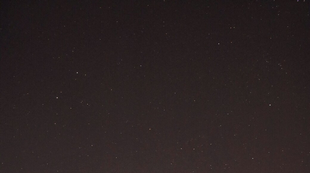 A no fishing sign hangs on the arch bridge across Ada Hayden Heritage Park Lake.