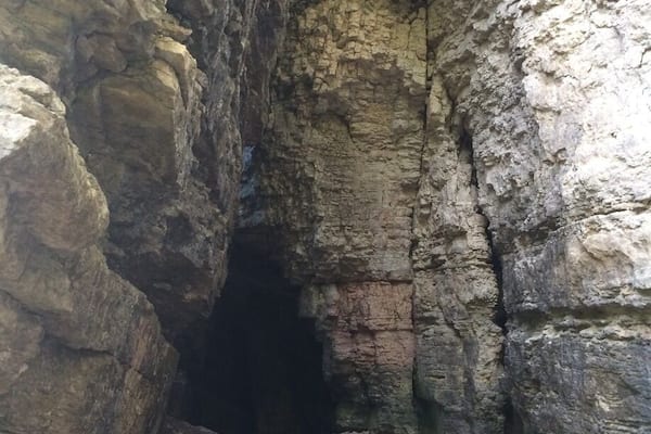 The Ice Cave is located at the top of a stone stairway and tucked within the rocky hillside. Bring a flashlight and explore! Most of the cave is now closed so only a few caverns remain, but the trek is still worth it! #localgem