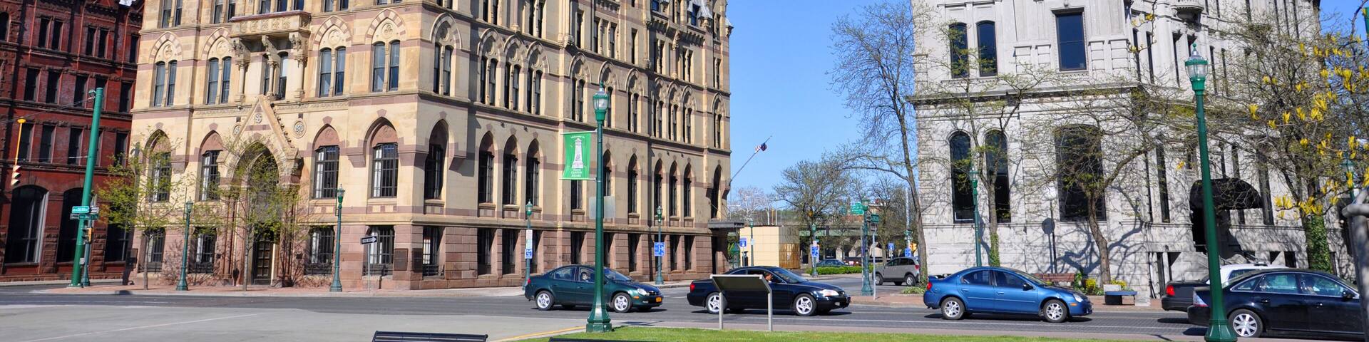 Syracuse savings Bank Building (left) and Gridley Building (right) at Clinton Square in downtown Syracuse, New York State, USA. Syracuse Savings Bank Building was built in 1876 with Gothic style.