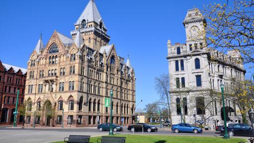 Syracuse savings Bank Building (left) and Gridley Building (right) at Clinton Square in downtown Syracuse, New York State, USA. Syracuse Savings Bank Building was built in 1876 with Gothic style.