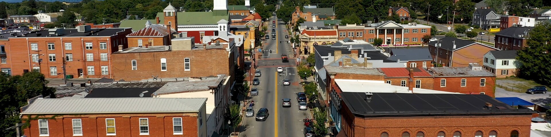 Low aerial view of main street usa, Charles Town, West Virginia, WV on a beautiful sunny day.